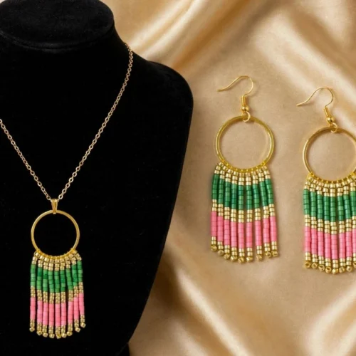 Gold-tone hoop pendant necklace with pink and green seed bead fringe and matching hook earrings